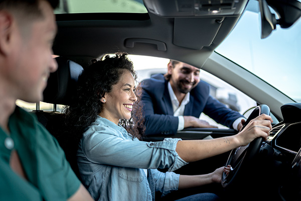 couple trying out a car