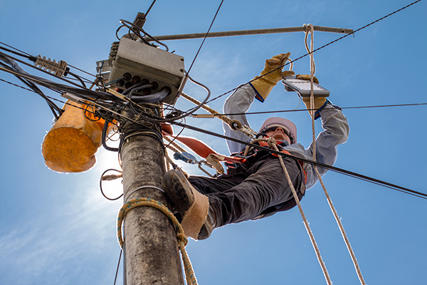 lineman working on electrical lines