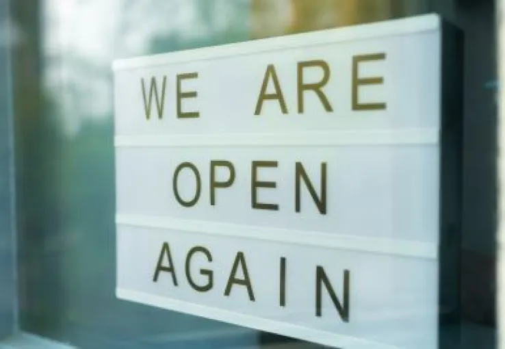 we-are-open-again-sign-on-door