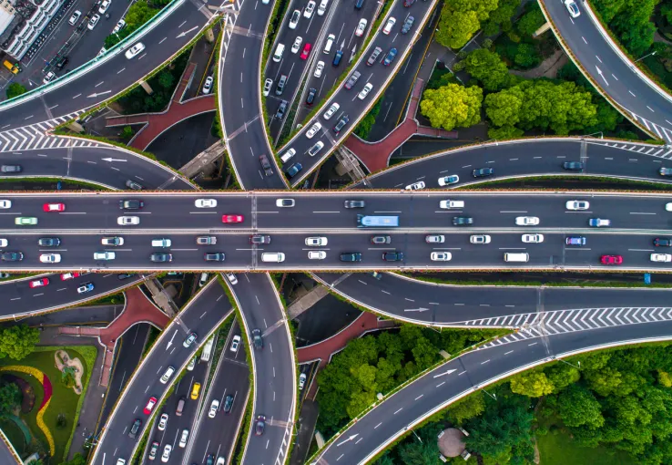 Aerial view of highway crisscrossing at an interchange.